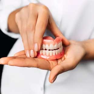 Enhance your smile with custom dentures in Sugar Land, TX 77479